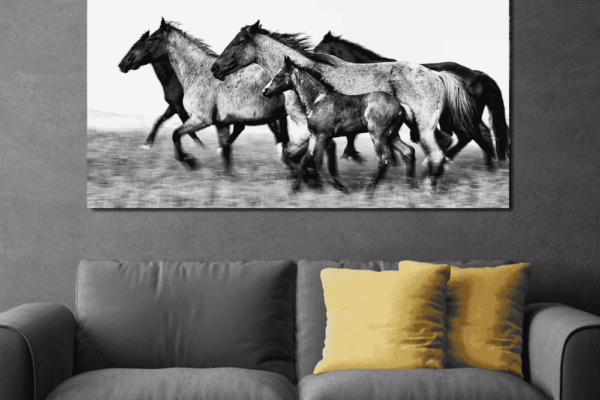 Large-format 'Unity' horse print by Ejaz Khan, styled as a sophisticated fashion statement in a luxury monochrome living room.