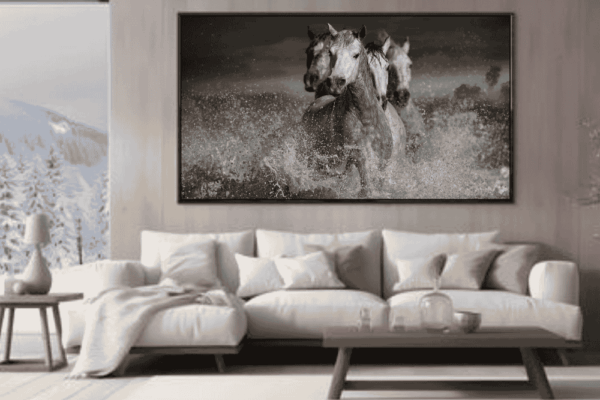 Large-format 'Fatigue' horse print styled as a dramatic, textured centerpiece in a high-end monochrome living room.