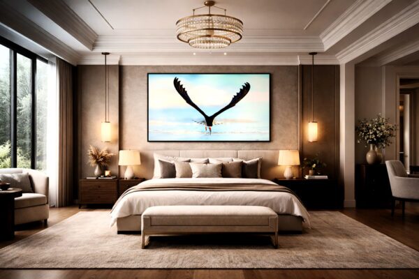Skimmer bird fine art photography displayed as wall art above a bed in a bedroom interior